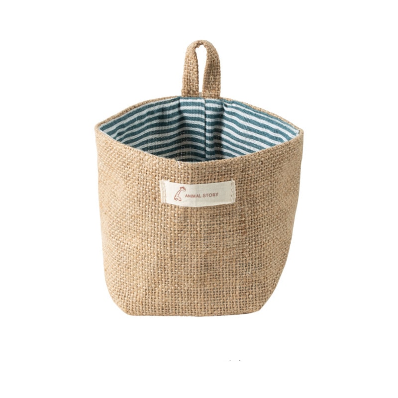 Woven hanging wall storage basket shaped like a bag – green variant, another view