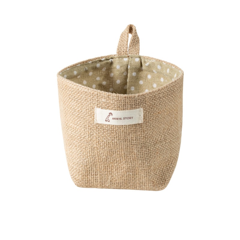 Woven hanging wall storage basket shaped like a bag – beige variant, another view