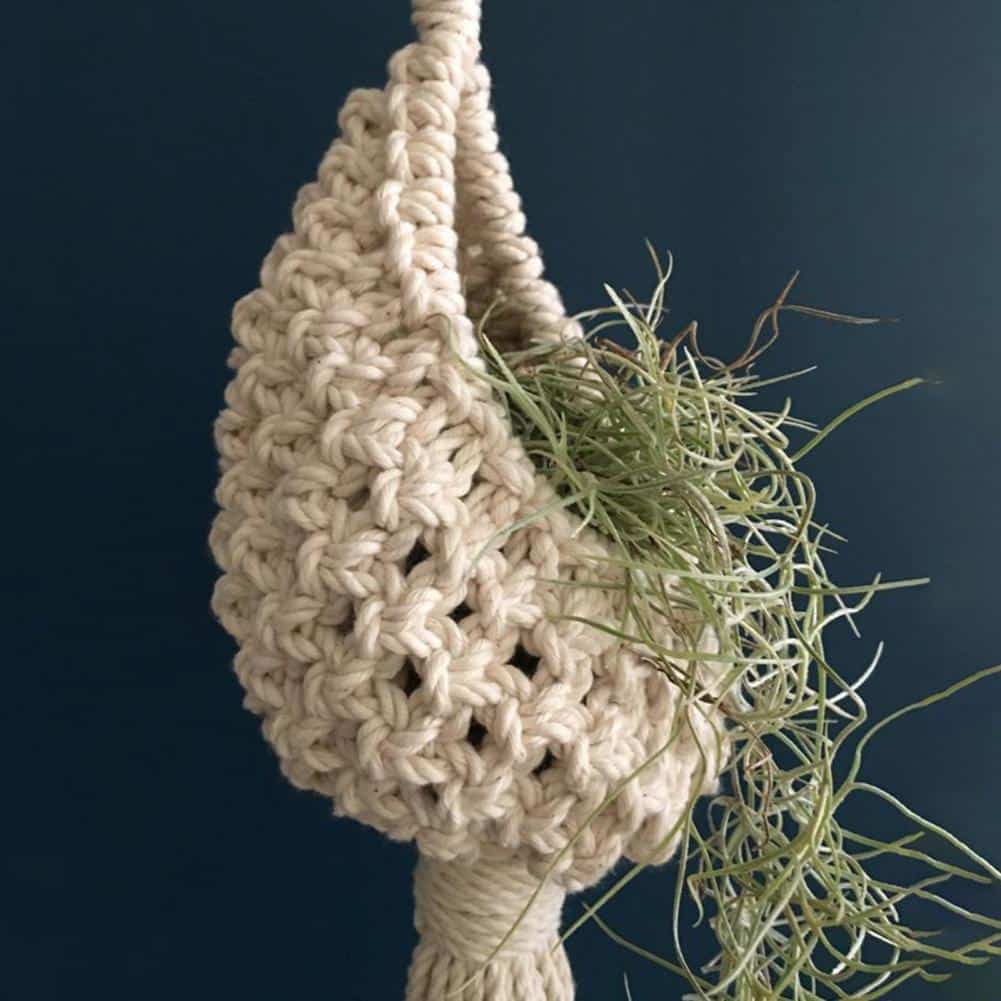 White woven cotton hanging planter basket – shown in a room setting (2)