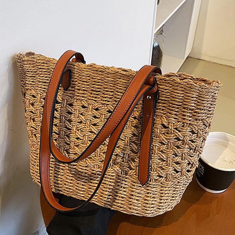 Structured handwoven straw handbag