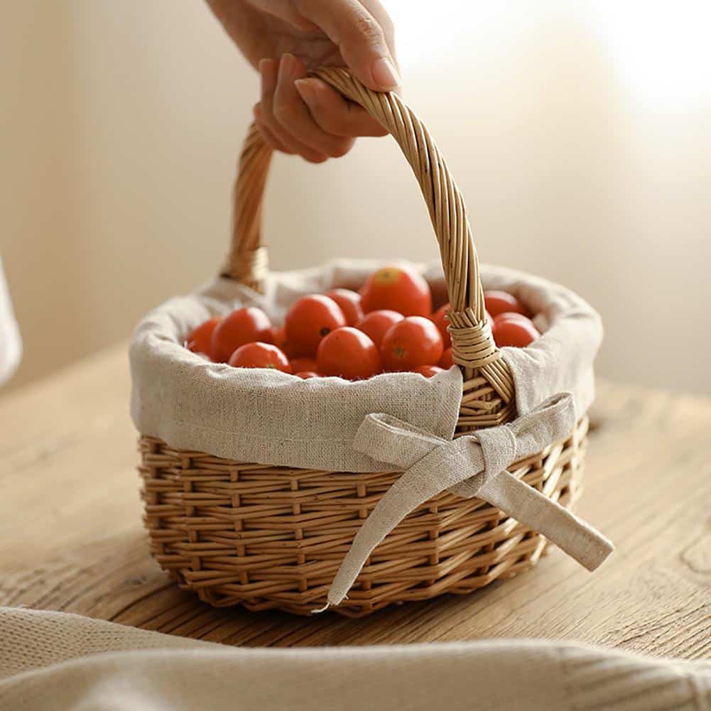 Woven storage basket with a handle and beige fabric lining – shown in use (2)
