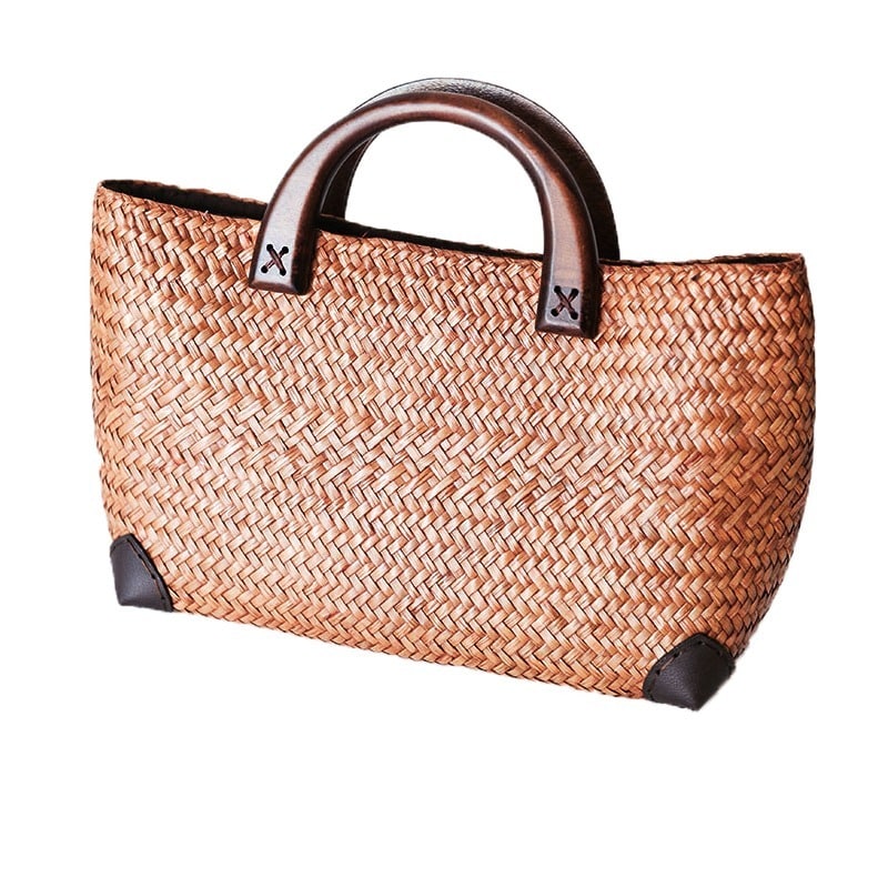 Elegant rattan tote with polished wooden handles – another view