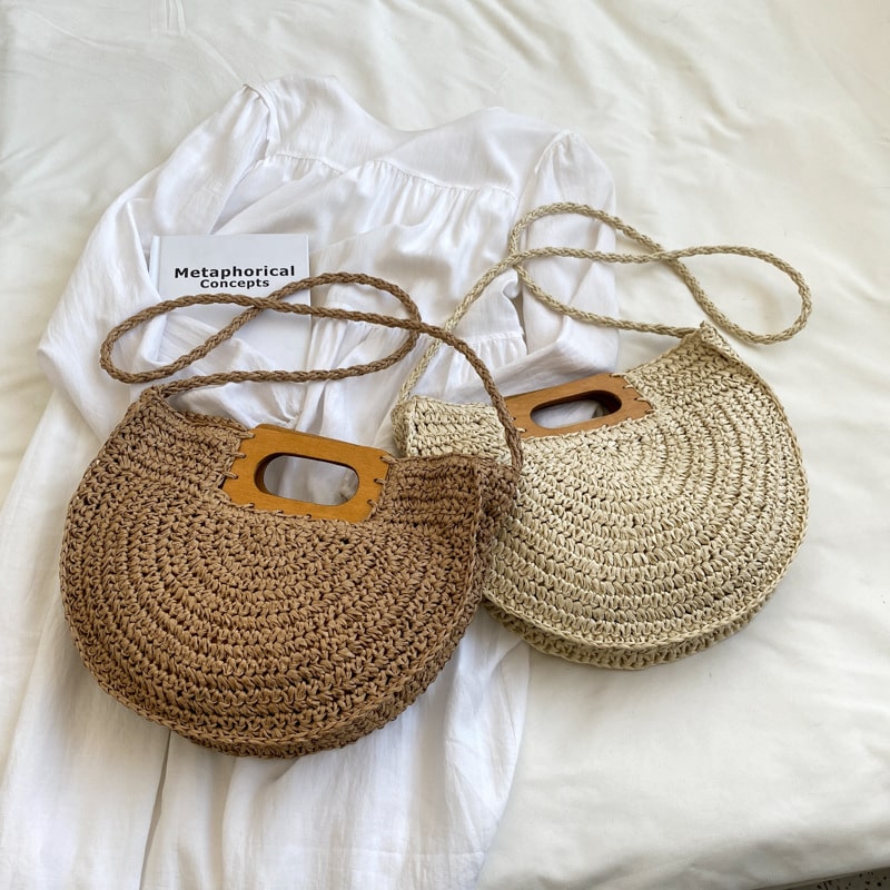 Rounded rattan handbag with a raw wood handle – multiple views