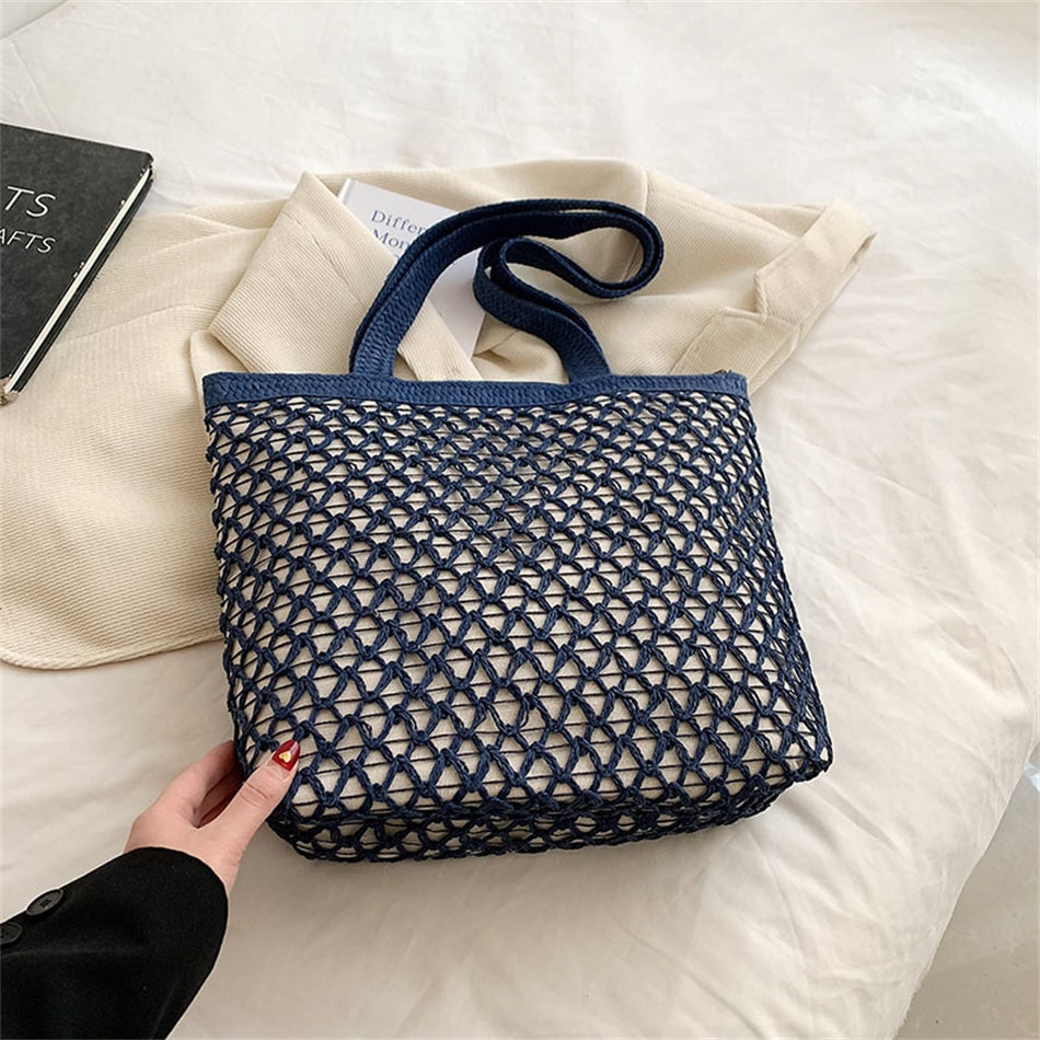 Golden woven handbag with a central zipper – blue variant, another view