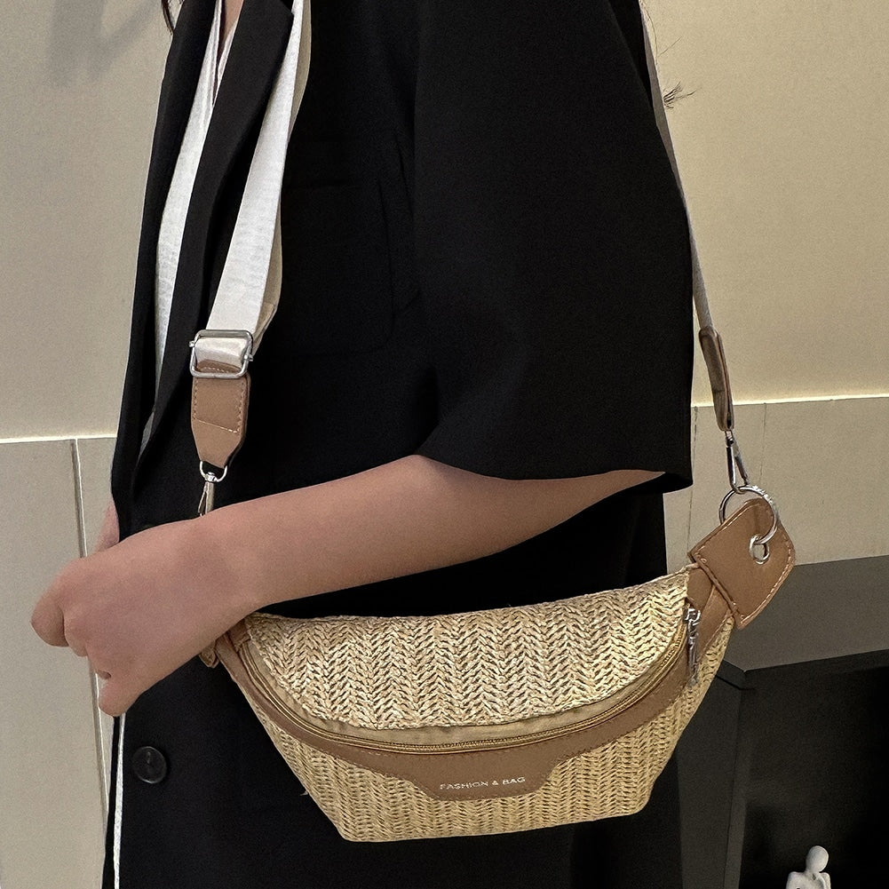 Elongated woven straw crossbody bag – worn by a model (2)