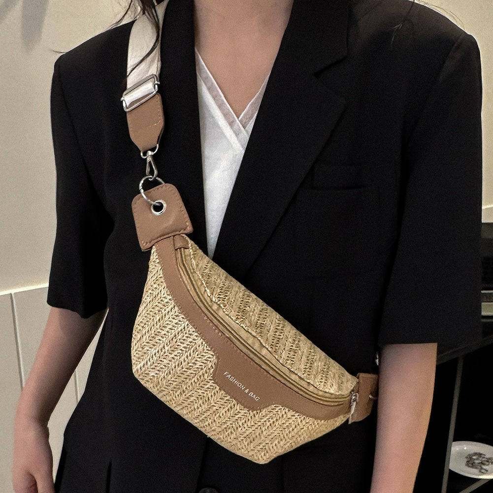 Elongated woven straw crossbody bag – worn by a model