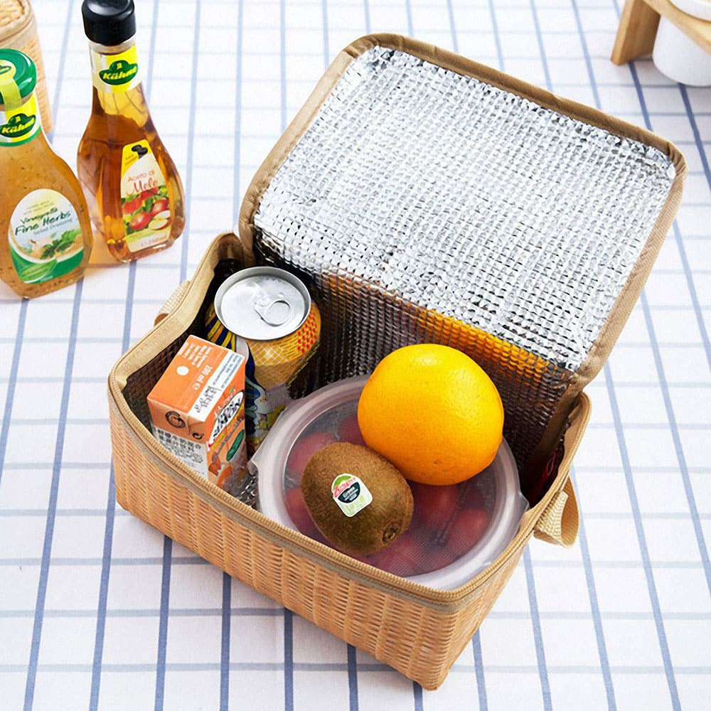 Insulated waterproof rattan picnic bag – shown in a room setting