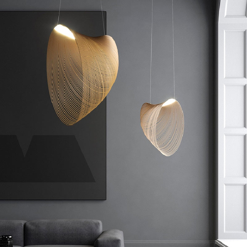Futuristic geometric wood blade pendant light – shown in a room setting (5)