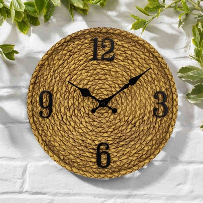 Outdoor rattan-look wall clock – shown in a room setting