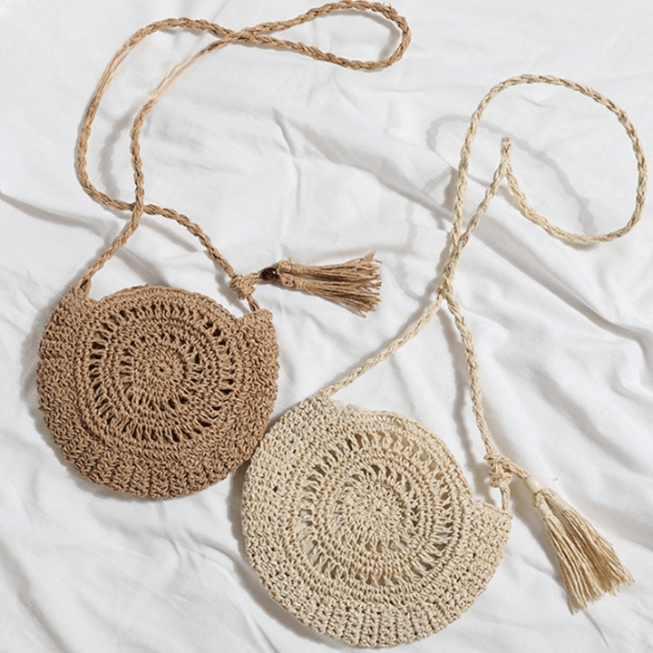 Soft round handwoven straw bag