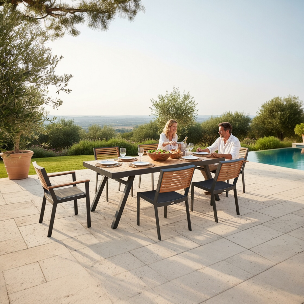 York black aluminum bistro armchair with teak slat back – shown outdoors (2)