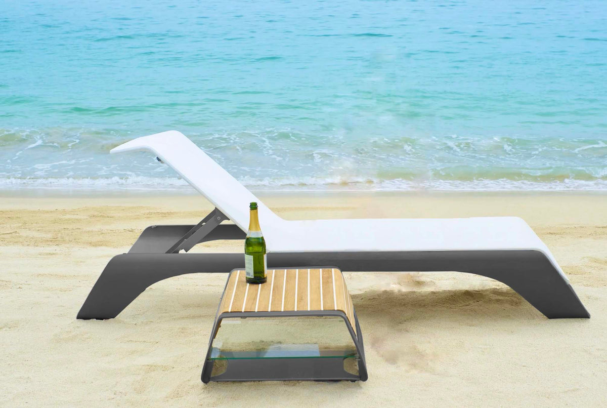 Onda gray aluminum pool lounger with side table – shown outdoors (4)