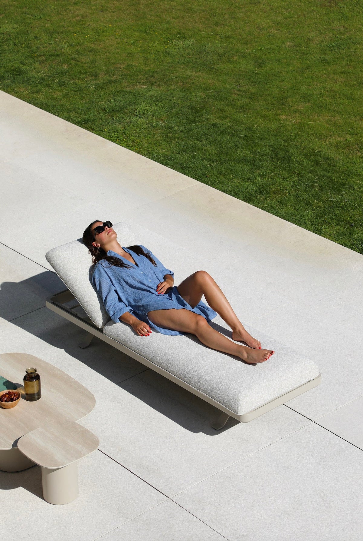 Camille 3-seat aluminum outdoor sofa that converts to a lounger – shown outdoors (5)