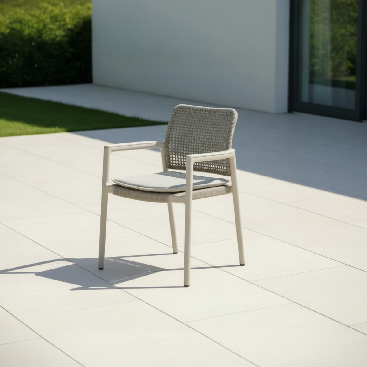 Matia beige stackable rope dining chairs, set of 4 – shown outdoors