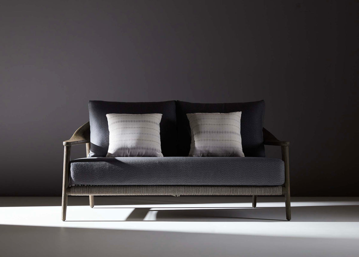 2-seat sofa from the Come solid teak and beige rope patio set with loveseat and two armchairs
