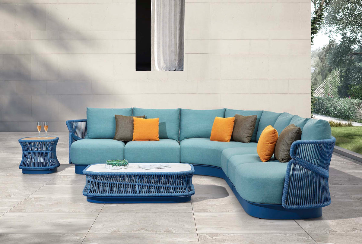 Laska curved blue rope outdoor corner sofa set with ceramic coffee table – shown outdoors (5)