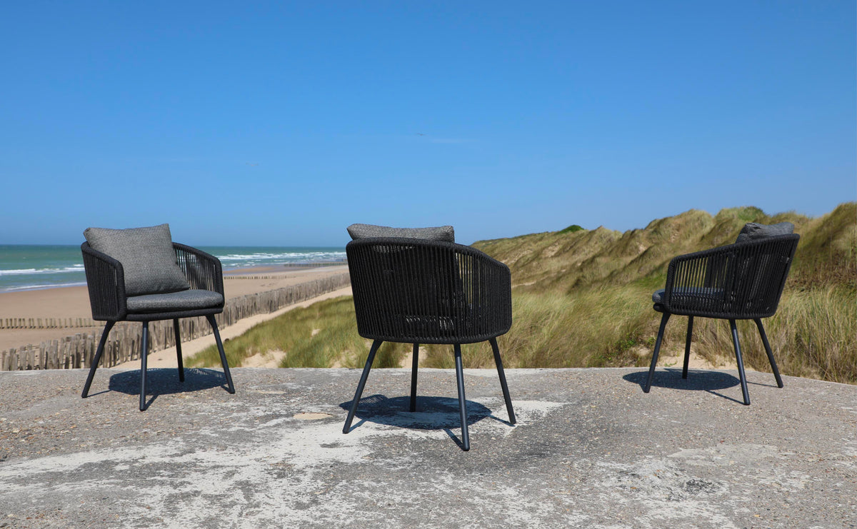Livio black aluminum and rope outdoor dining armchair – shown outdoors (9)