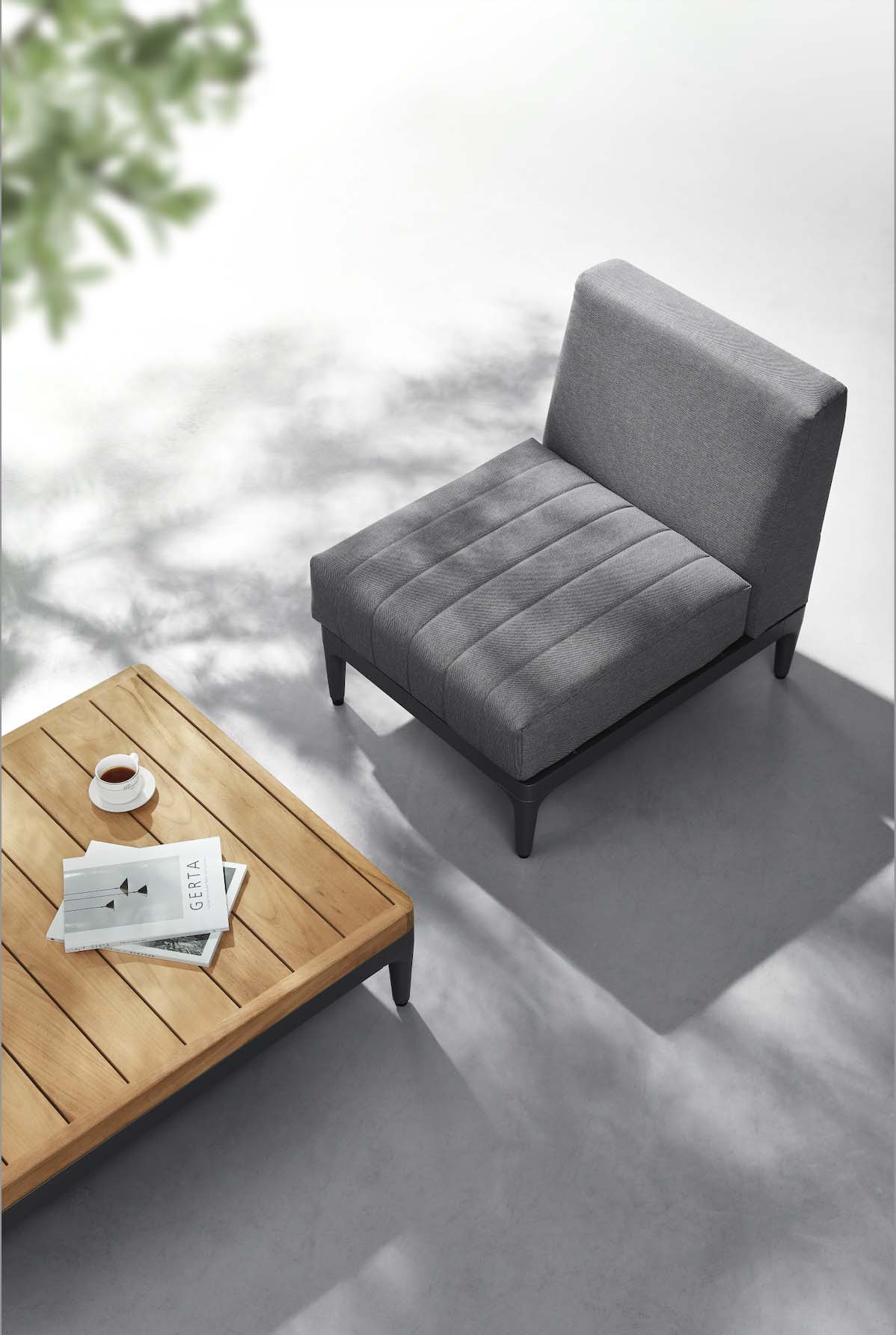 Armless chair from the Sira Mini compact anthracite aluminum and teak outdoor sectional – close-up detail