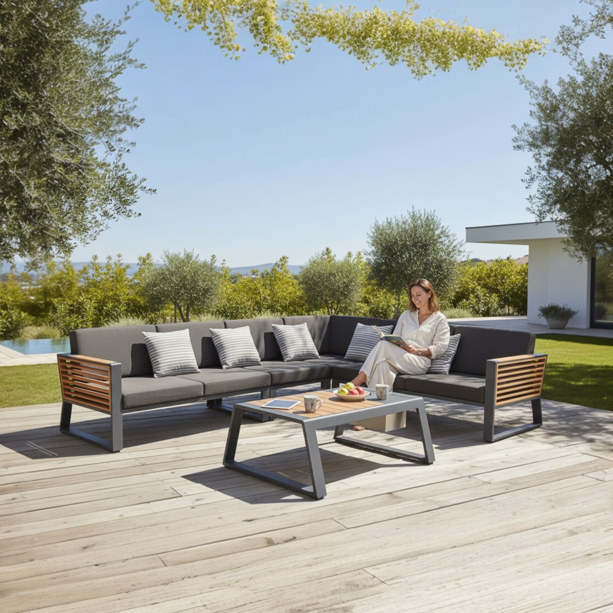 Cofy aluminum and teak outdoor sectional with drink cooler coffee table – shown outdoors (3)