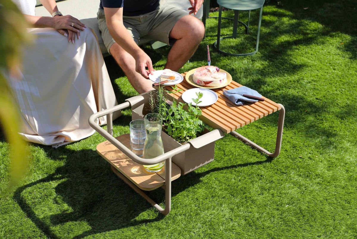 Sunny beige convertible aluminum outdoor sofa lounger – shown in use