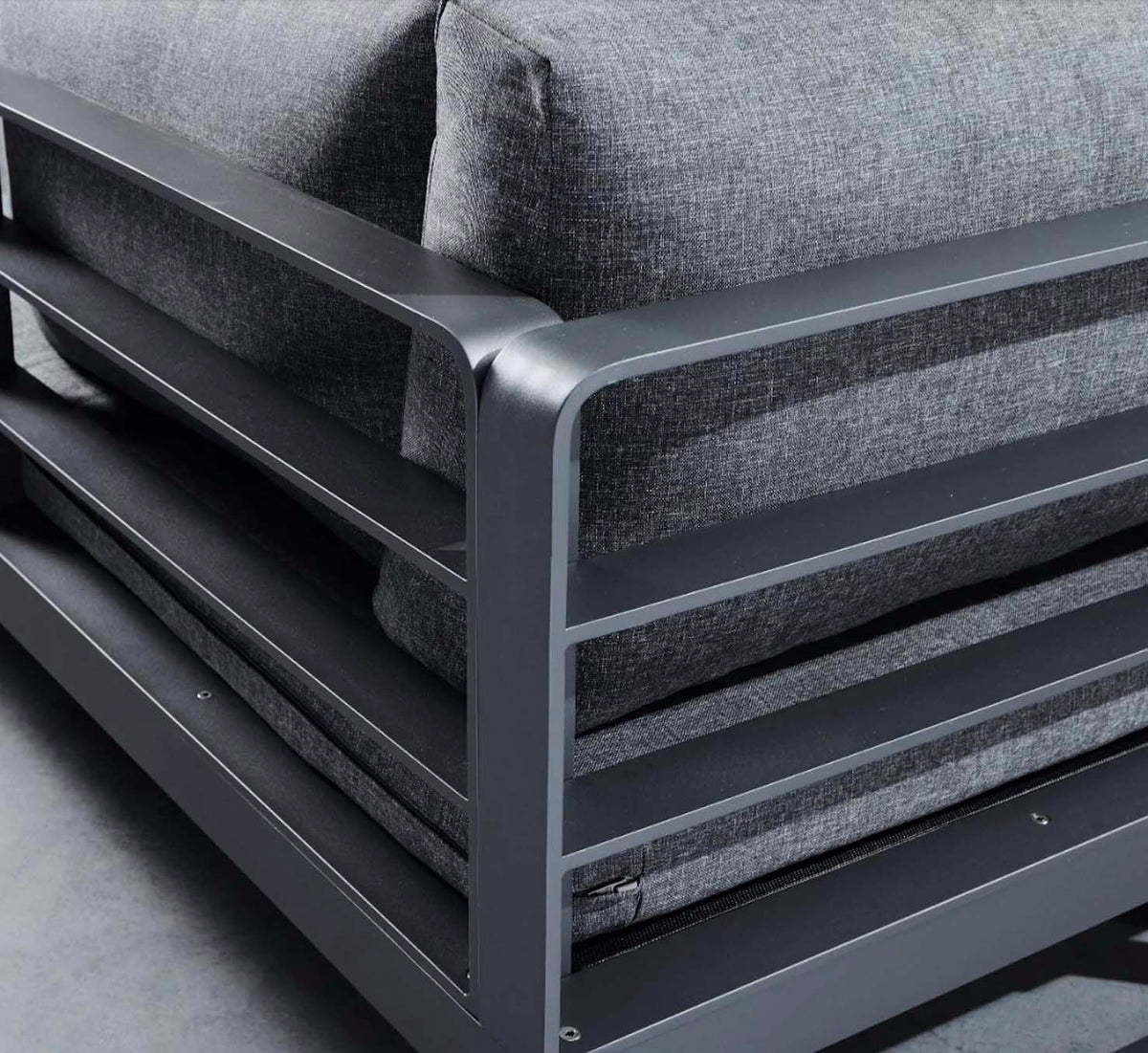 Caribbean anthracite aluminum outdoor sectional with teak side tablets – close-up detail
