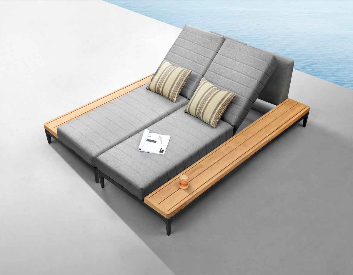 Sira anthracite aluminum and teak double chaise lounge – shown outdoors (3)