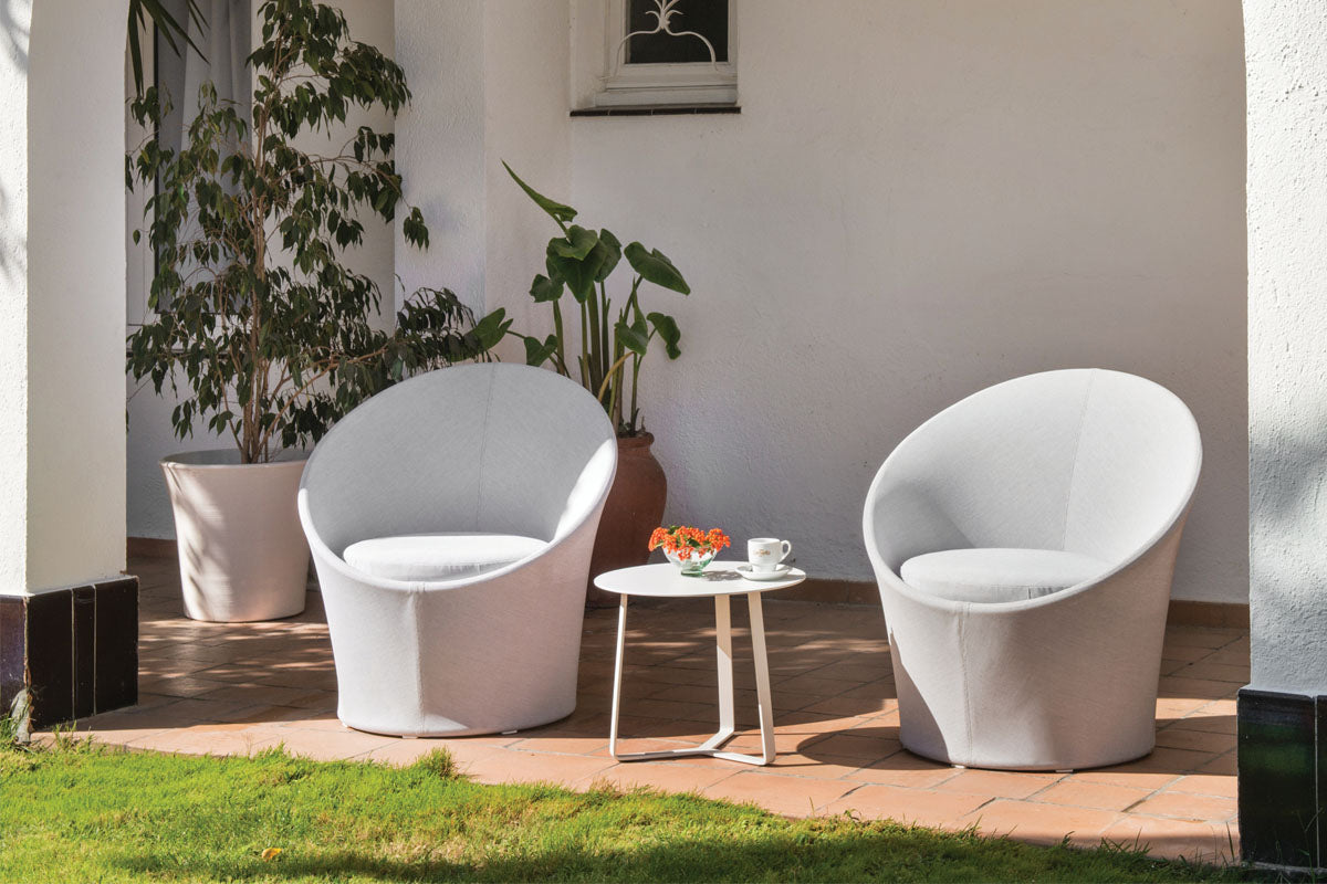 Luna white balcony furniture set with two round armchairs and small table – shown outdoors (3)