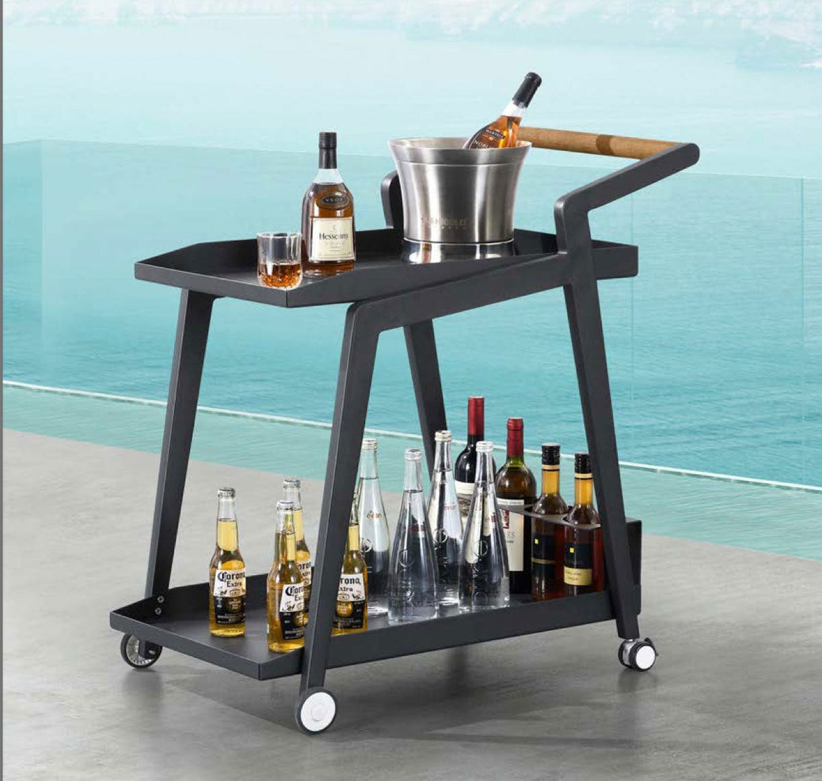 Lovy black aluminum outdoor bar cart with teak handle – shown outdoors