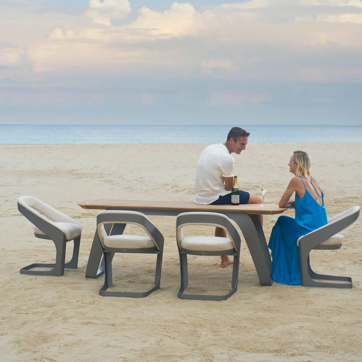 Onda aluminum and teak Sunbrella outdoor dining set – shown outdoors (6)