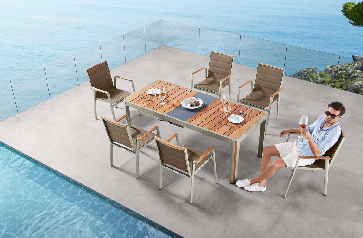 Geneva aluminum and teak outdoor dining set with center ice bucket – shown outdoors (3)