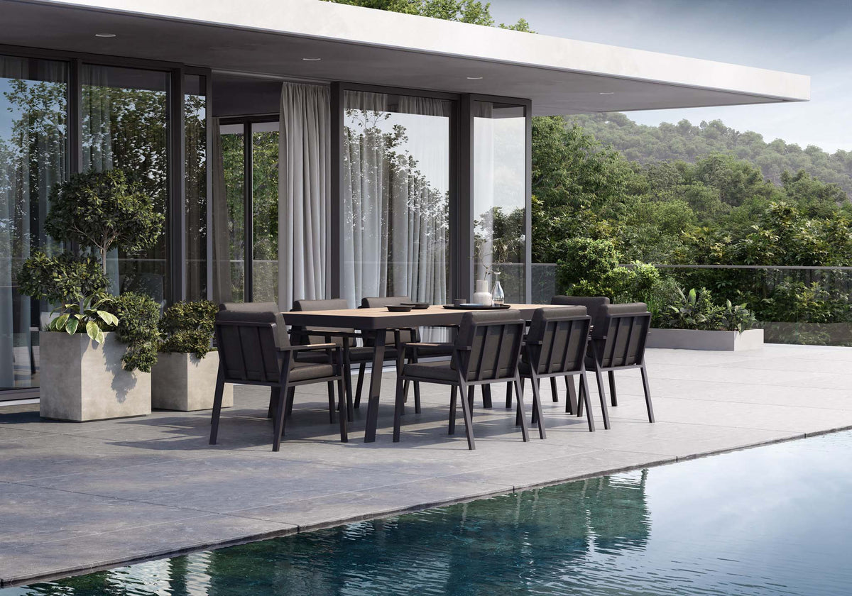 Noffy black aluminum and teak dining armchair – shown outdoors (3)