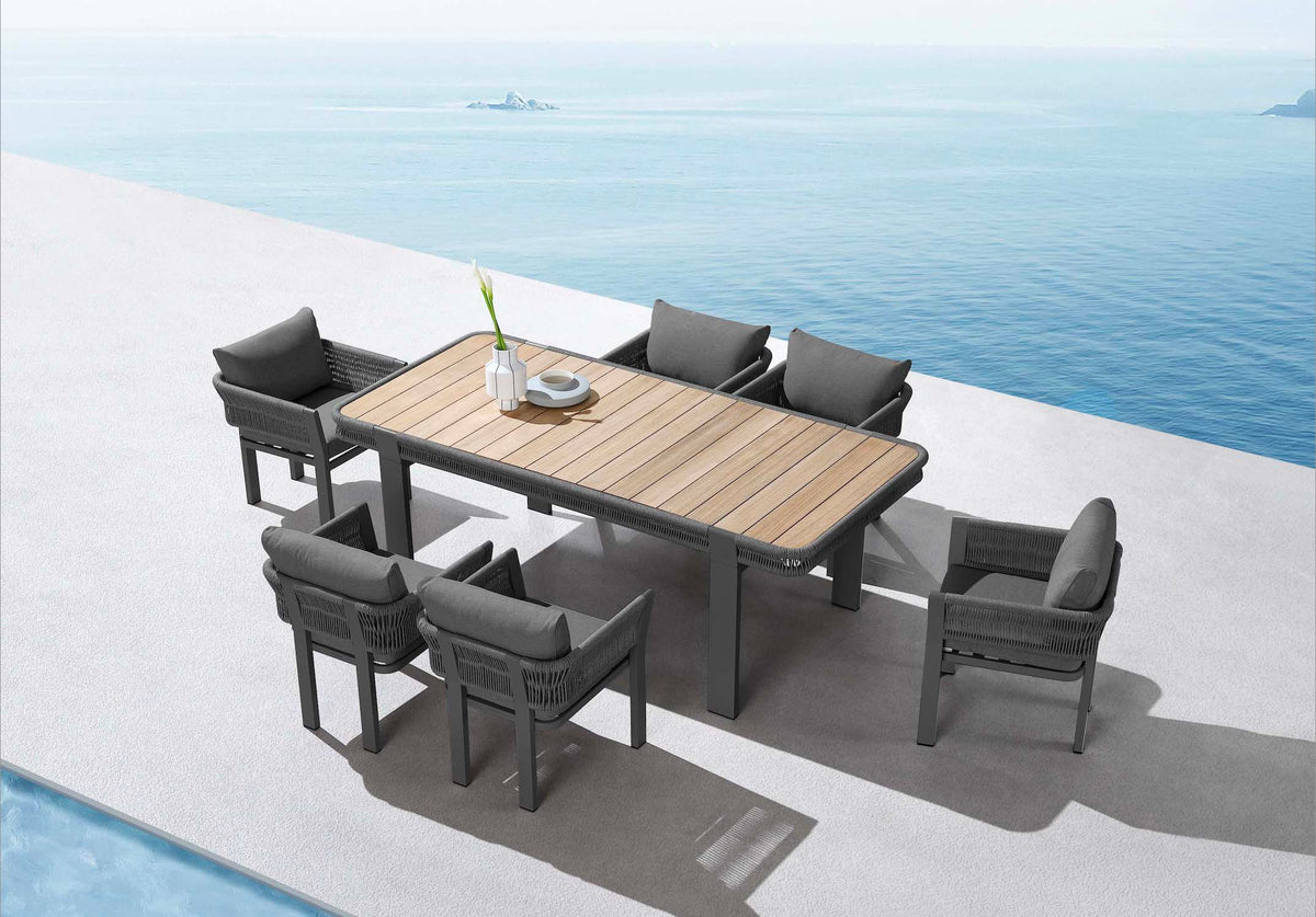 Olby black rope outdoor dining set with six armchairs and teak table – shown outdoors (4)