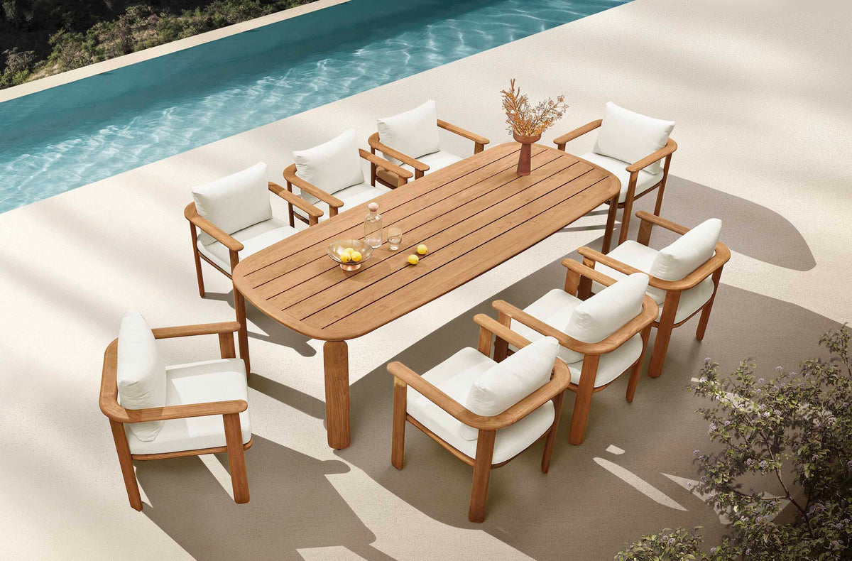 Roma 8-seater solid teak outdoor dining set with slatted armchairs – shown outdoors (3)