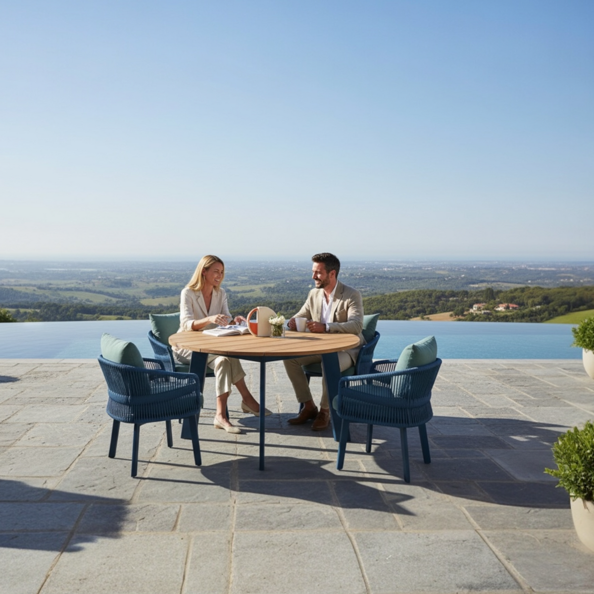 Laska round teak and blue rope dining set for four – shown outdoors (2)