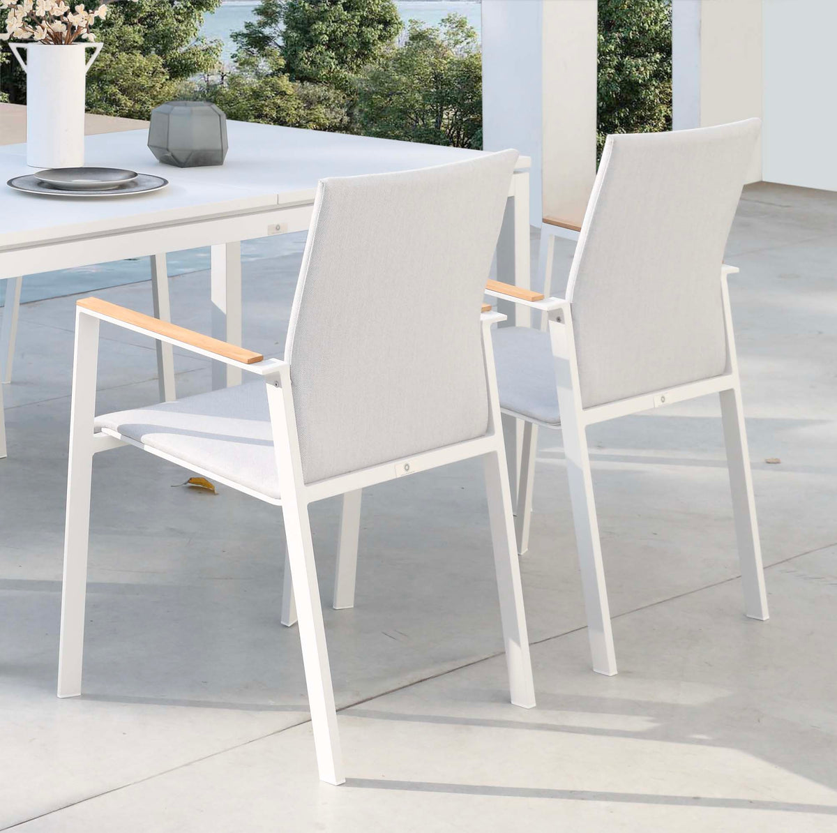 Lilou white aluminum padded textilene dining chairs, set of 2 – shown outdoors (4)