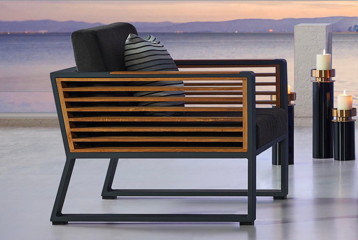 Armchair from the Cofy Mini black aluminum loveseat patio set with teak cooler coffee table – close-up detail