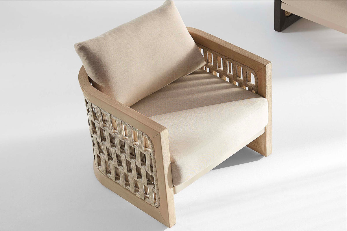 Armchair from the Palma solid teak and rope outdoor sofa set with teak coffee table