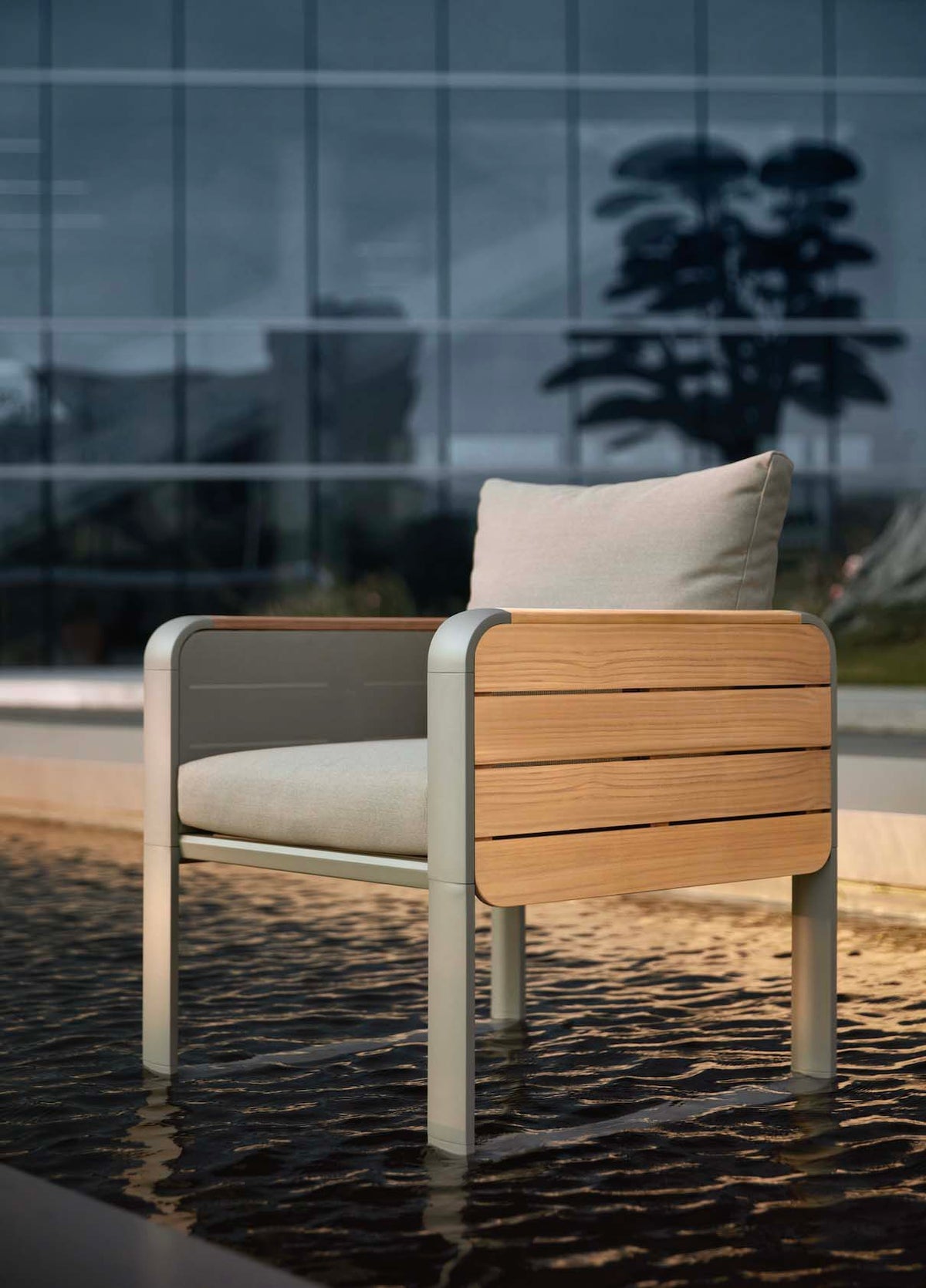 Armchair from the Talia aluminum and teak dining set with flip-up side tablets – close-up detail