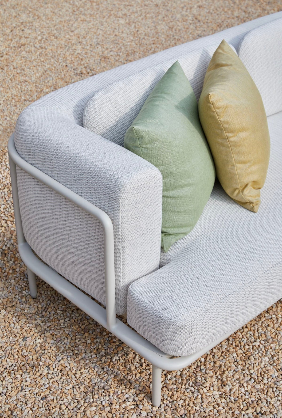 Chaise from the Flora white aluminum outdoor sectional with light gray cushions – close-up detail (2)