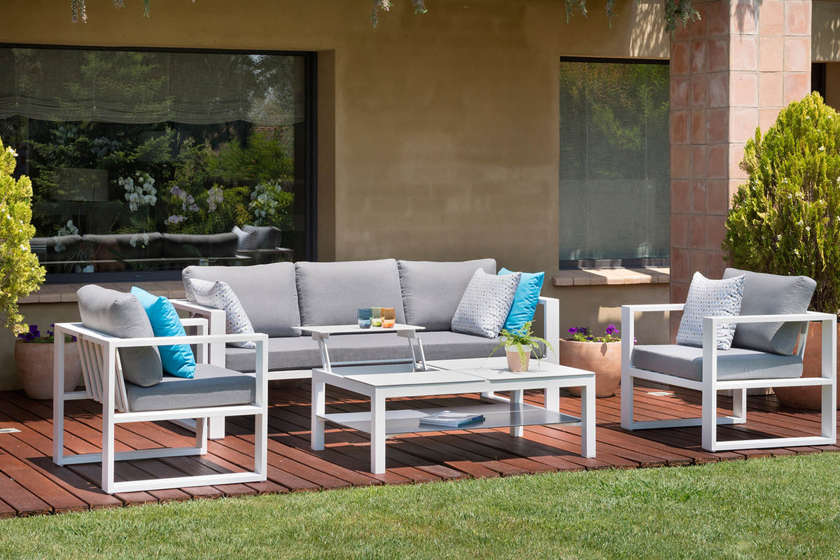 Jelly white aluminum patio set with lift-top coffee table raised – shown outdoors (3)