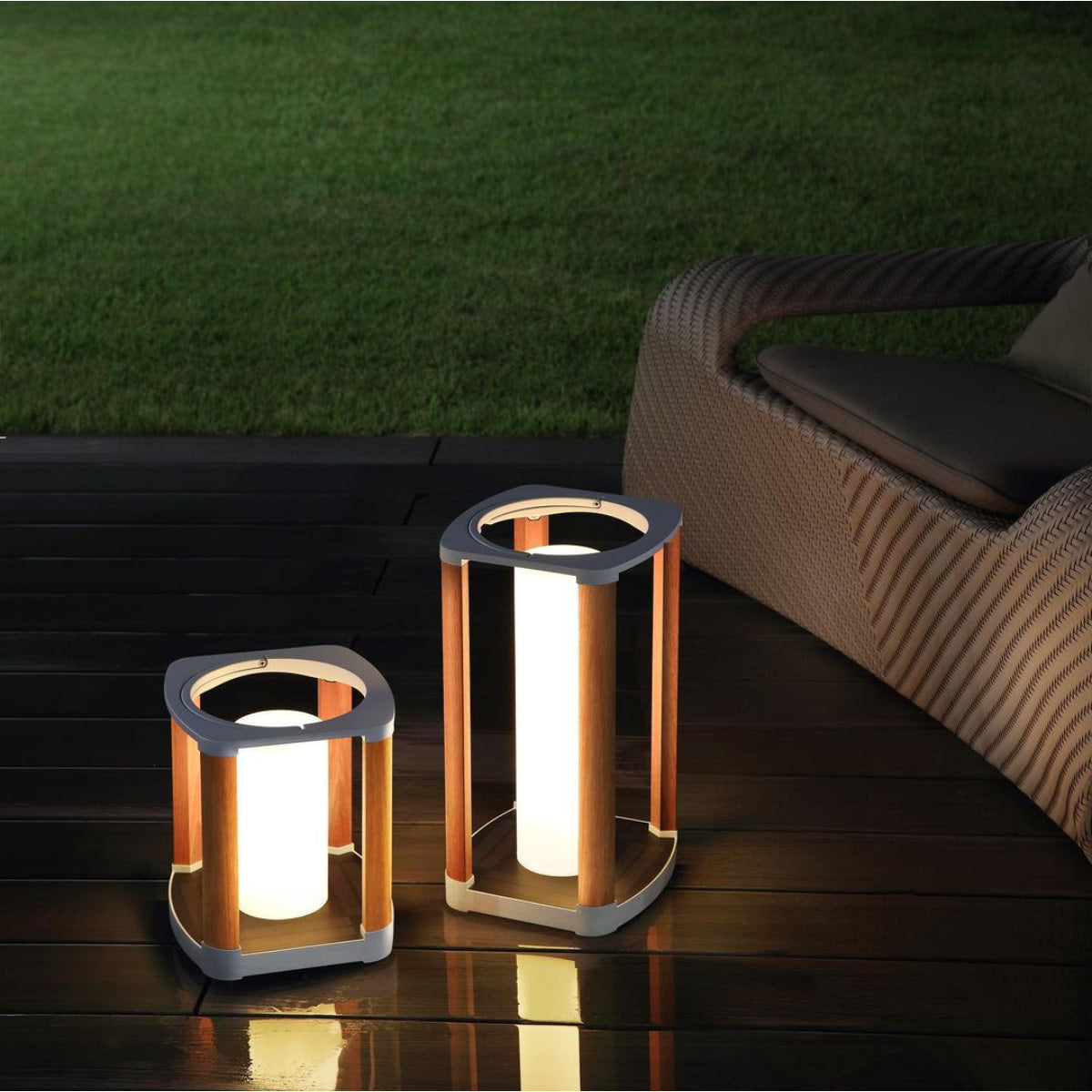 Aurora white solar outdoor lantern, small – shown lit outdoors (3)