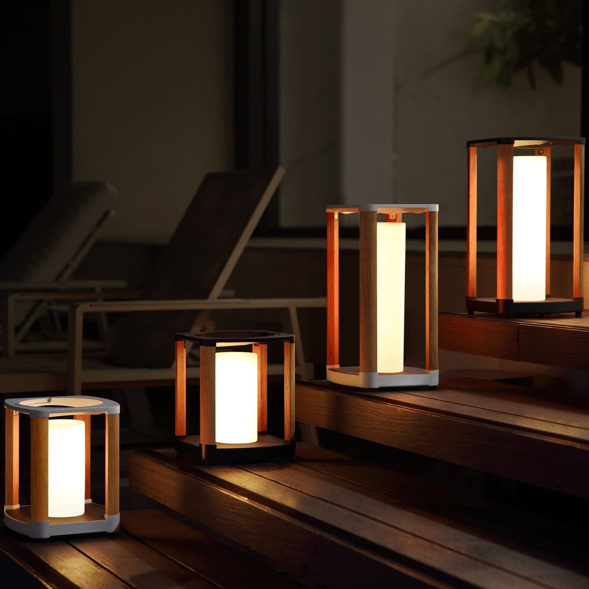 Aurora black solar outdoor lantern, medium – shown lit outdoors (3)