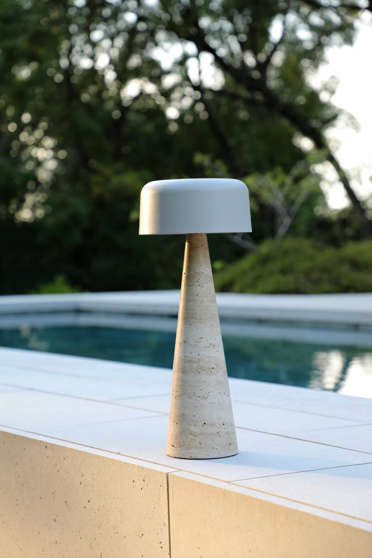 Moon travertine solar outdoor lamp, large – shown outdoors (2)