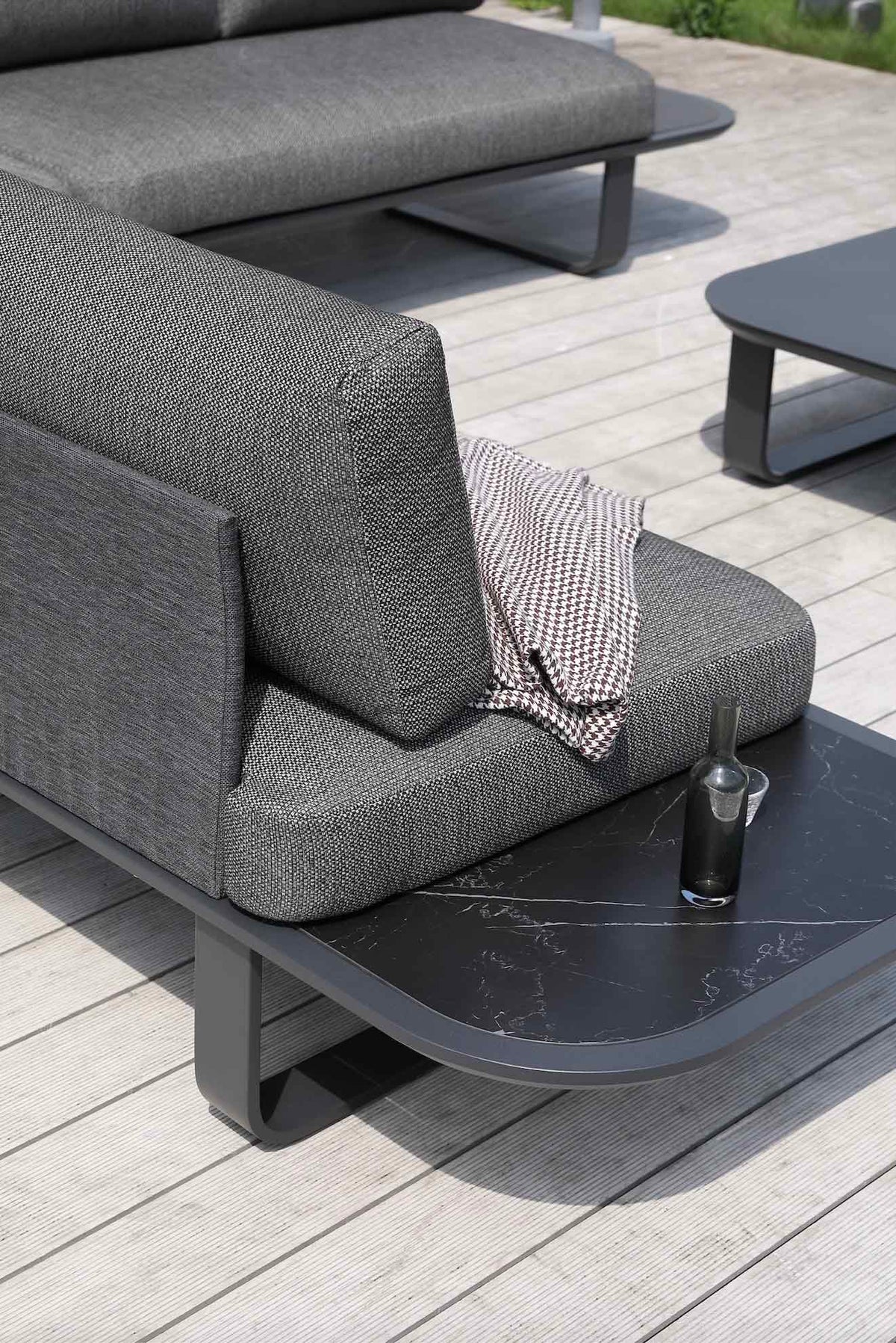 Chaise from the Emy black aluminum corner sectional with sunproof olefin cushions – close-up detail