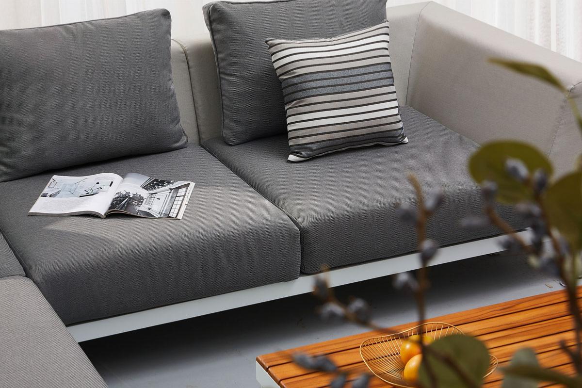 Chaise from the Orsy Mini white aluminum and teak 2-in-1 patio lounge set with sunbed – close-up detail