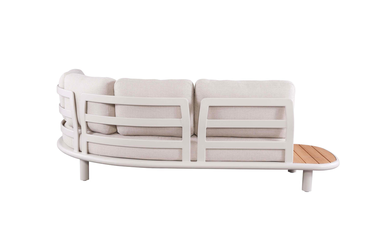 Chaise from the Sanka Cosy curved beige aluminum corner sofa with integrated teak platform – another view (2)