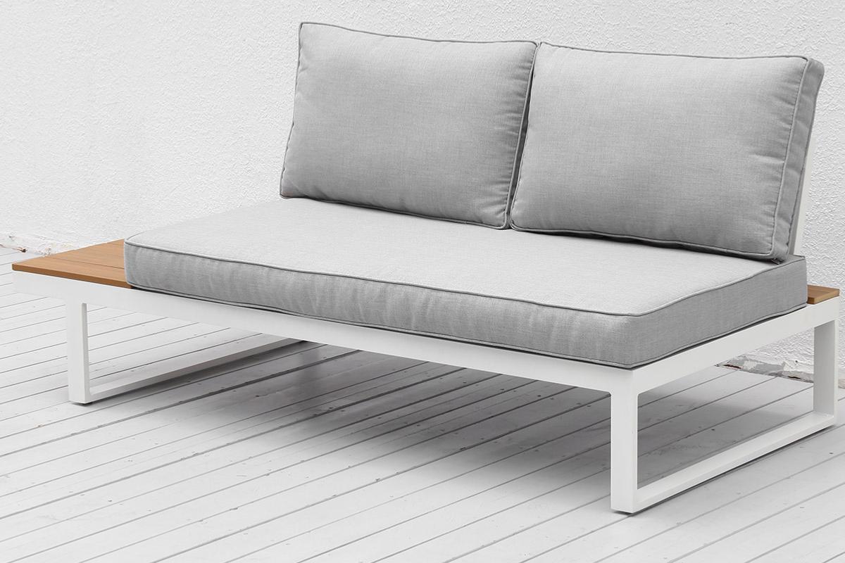 Chaise from the Stacy white aluminum corner outdoor sofa with light gray cushions