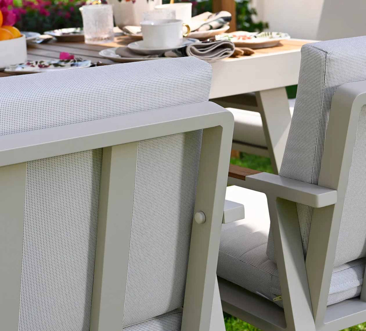 Armchair from the Noffy compact square aluminum and teak dining set for four – close-up detail (2)