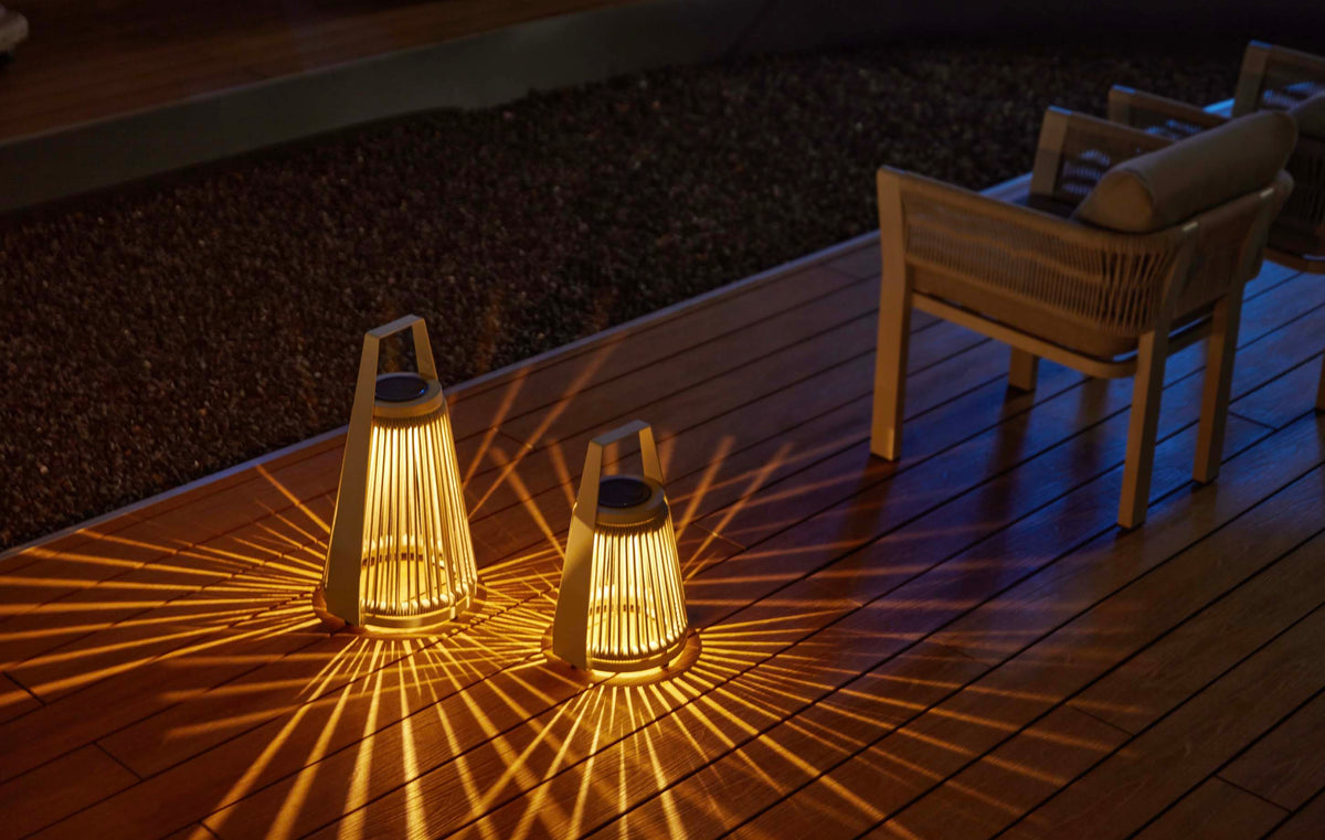 Milan beige rope solar outdoor lamp – shown lit outdoors