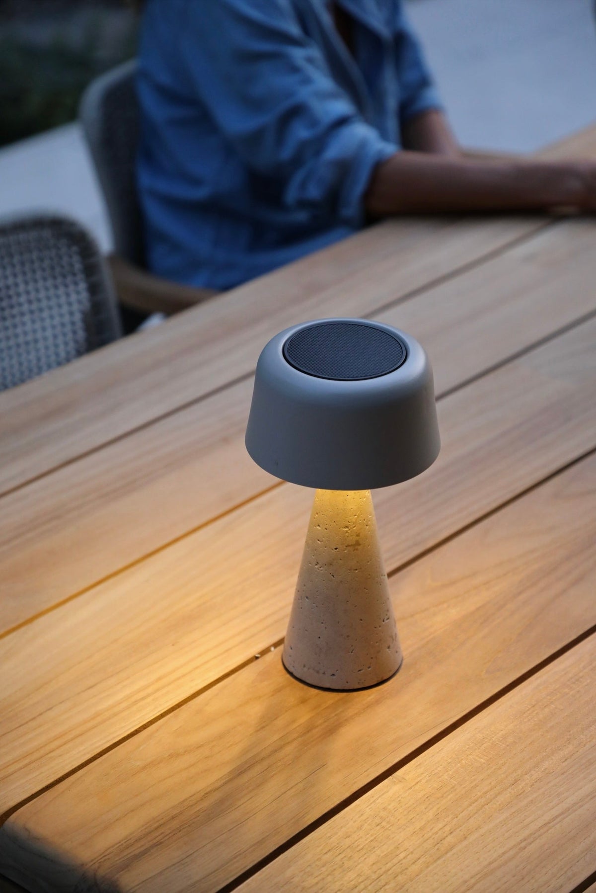 Moon travertine solar outdoor lamp, small – shown lit outdoors